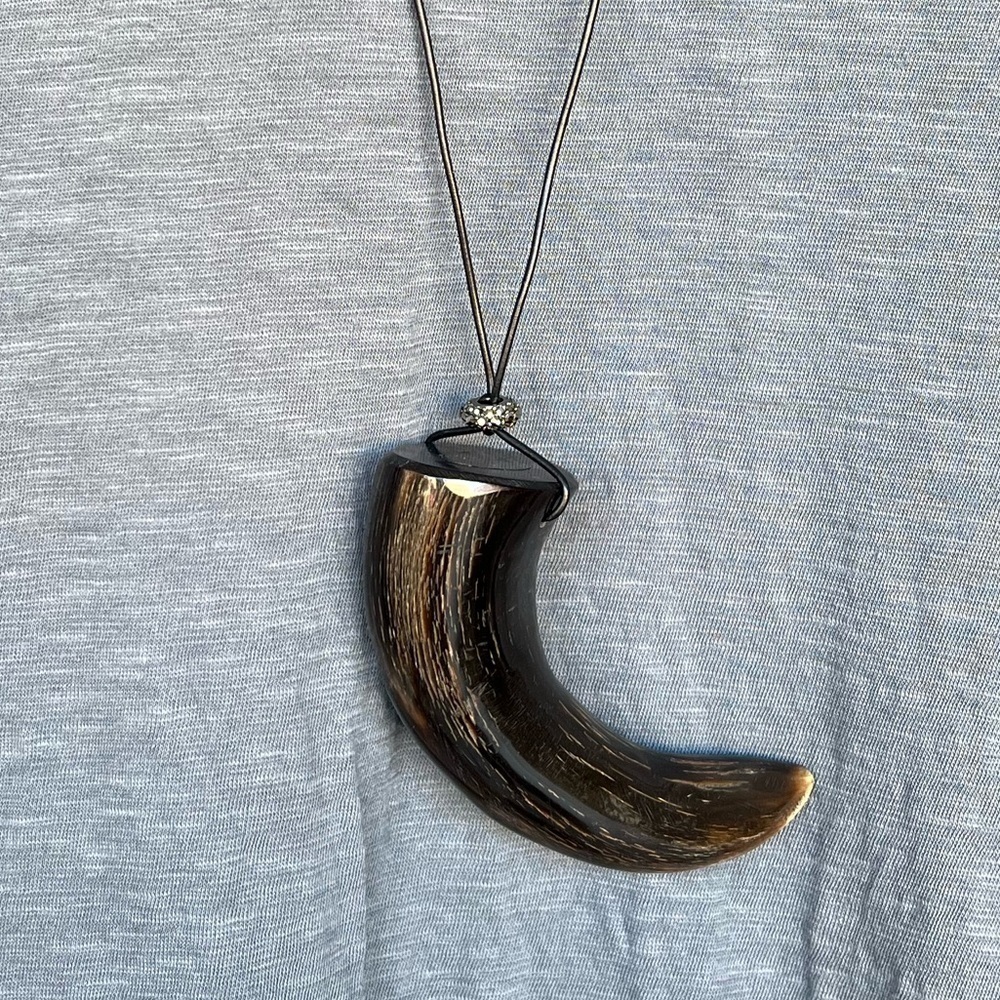 Faux horn oversized resin necklace on a leather cord